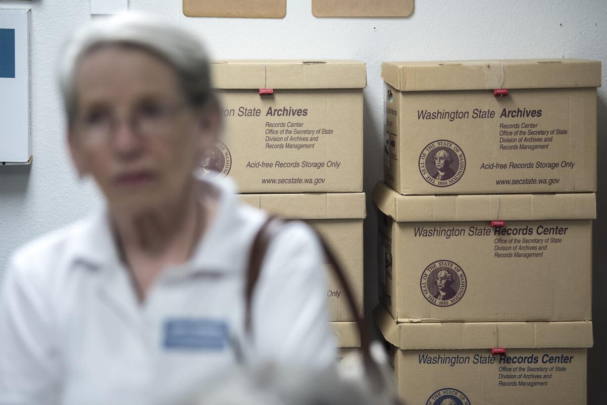 Scanned ballots are seen here in secured storage boxes within the Ballot Tabulation Room of the Clark County Election Office on Tuesday night, Aug. 6, 2019.