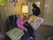 Murillian “Mimi” Allen of Vancouver celebrates her 105th birthday with her granddaughter-in-law, Tammie Gower of Washougal, at Brookdale Vancouver Stonebridge on Monday afternoon.