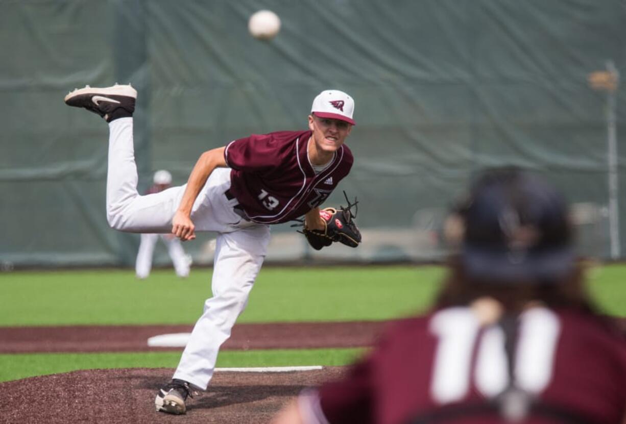 Ridgefield Raptors' Hayden Minich (13) pitches during final game of the season against the Bend Elks at the Ridgefield Outdoor Recreation Complex, Sunday, August 11, 2019.