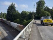 Traffic heads south over the Fruit Valley Road railway bridge in 2019.