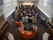 Ridgefield High School teachers meet in the media library in the new high school building, which will open in time for the start of the upcoming school year. The new building increases the size of the library and updates science labs, the Life Skills program and a few art classrooms.