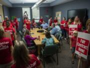 After the district refused to walk down a hallway lined with teachers to meet with the union’s bargaining committee in a conference room, the teachers walked down the hall and filed through the room where the district was waiting at La Center High School this morning. After the teachers filed through the room, the bargaining team entered and began the bargaining session with the district. The union voted 75-1 on Thursday to go on strike if a new deal isn’t reached by the first day of school on Aug. 28.