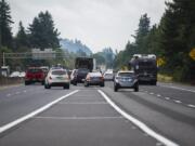 Vehicles merge onto state Highway 14 eastbound Wednesday afternoon from Interstate 205. Washington State Department of Transportation officials are urging drivers, during heavy congestion, to wait until their lane ends before doing a “zipper” merge with other vehicles.