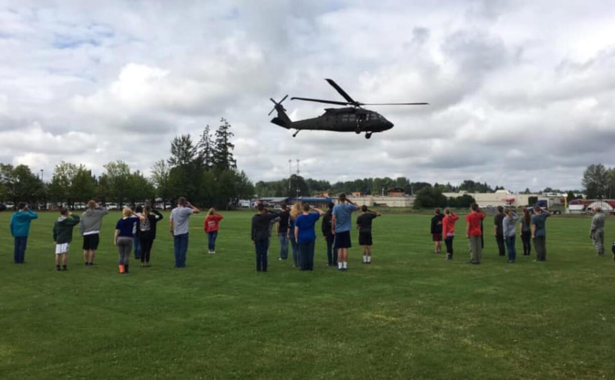 Battle Ground: Battle Ground High School AFJROTC cadets participated in a summer Leadership Laboratory program, where they met members of the Washington National Guard, who landed a Black Hawk helicopter on the practice football field.