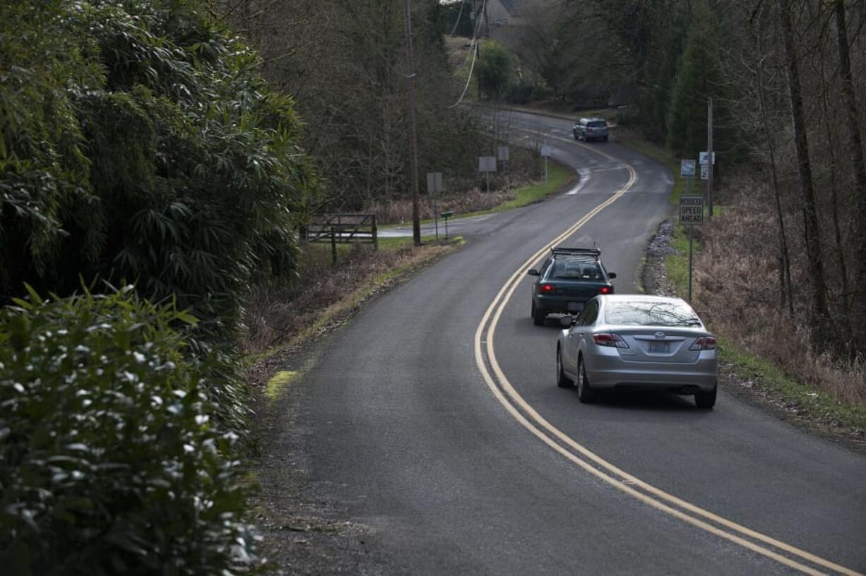 Drivers prepare to enter Ridgefield along the curvy, two-lane portion of Main Avenue, as seen in February 2016. Work started recently to add a dedicated pedestrian walkway and bike path along the road to make it easier to get to the Ridgefield National Wildlife Refuge.