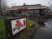 A sign directs customers to the Burgerville restaurant on Southeast Mill Plain Boulevard.