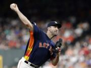 Houston Astros starting pitcher Justin Verlander throws during the first inning of a baseball game against the Seattle Mariners, Sunday, Aug. 4, 2019, in Houston.