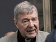 FILE - In this Feb. 26, 2019, file photo, Cardinal George Pell arrives at the County Court in Melbourne, Australia. Pell’s appeal against his convictions for child molestation was largely a question of who should the jury have believed, his accuser or a senior priest whose church role was likened to Pell’s bodyguard. Pell’s accuser was a 13-year-old choirboy when he alleged he was abused by then Melbourne Archbishop Pell at St. Patrick’s Cathedral in December 1996 and February 1997. The appeal court will give their verdict on Aug. 21.