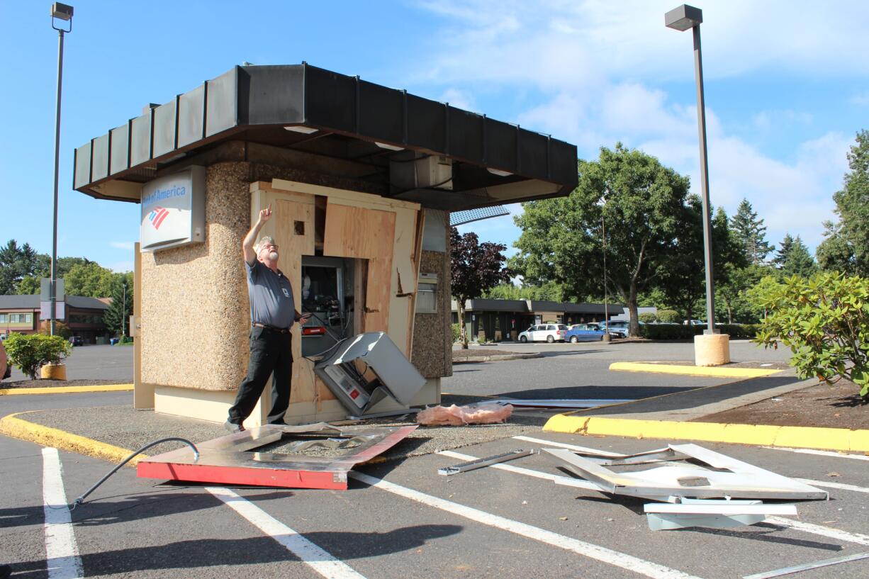 Vancouver police say someone used a stolen construction vehicle to break open this ATM at 5411 E. Mill Plain Boulevard early Friday morning.