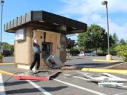 Vancouver police say someone used a stolen construction vehicle to break open this ATM at 5411 E. Mill Plain Boulevard early Friday morning.