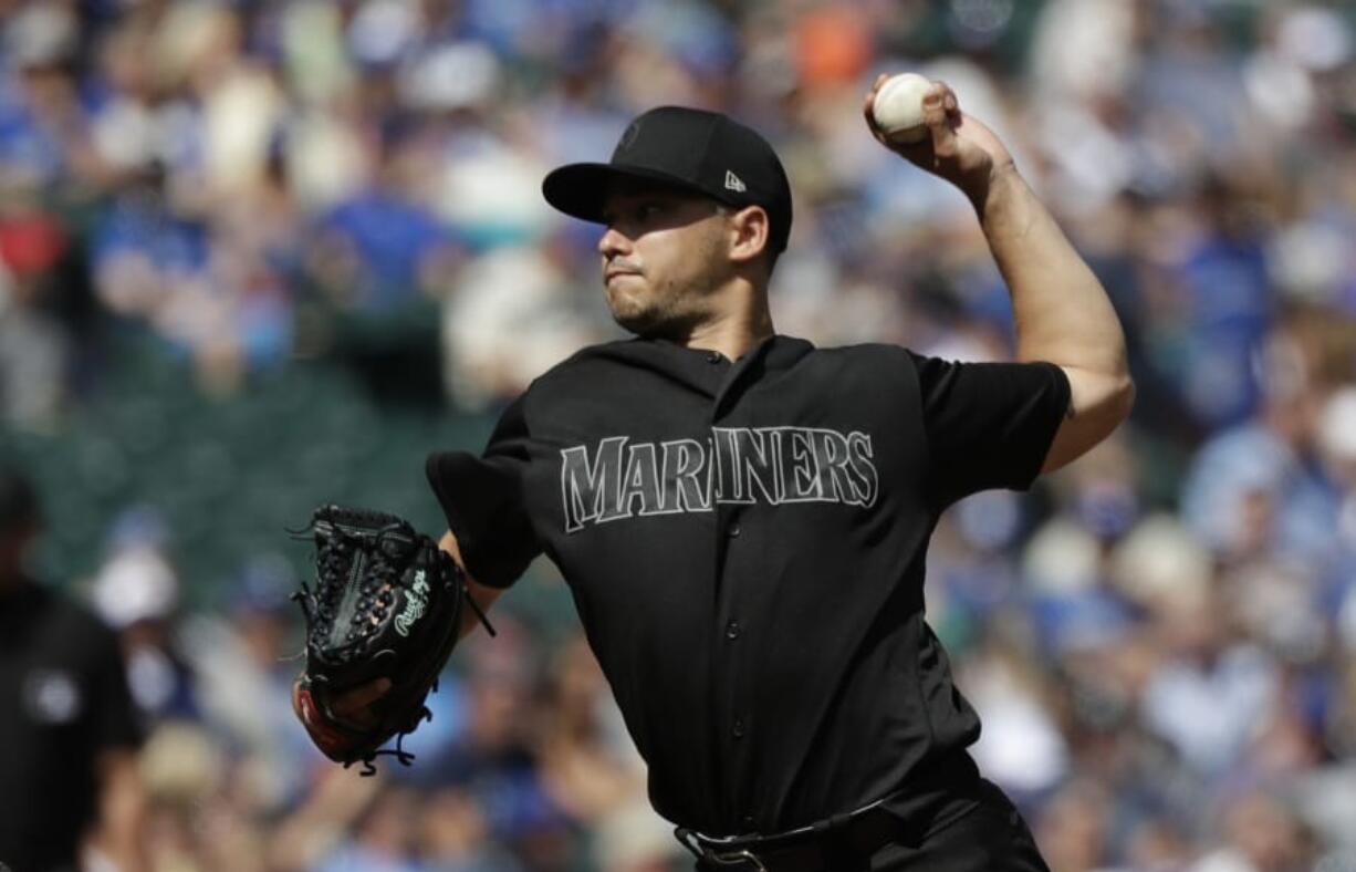 Seattle Mariners starting pitcher Marco Gonzales throws against the Toronto Blue Jays in the third inning of a baseball game Sunday, Aug. 25, 2019, in Seattle.