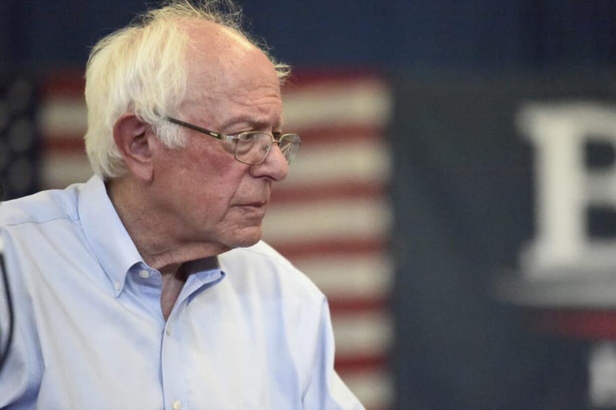 Democratic presidential hopeful Bernie Sanders looks on as panel members discuss his criminal justice reform plan during a town hall meeting on Sunday, Aug. 18, 2019, in Columbia, S.C.