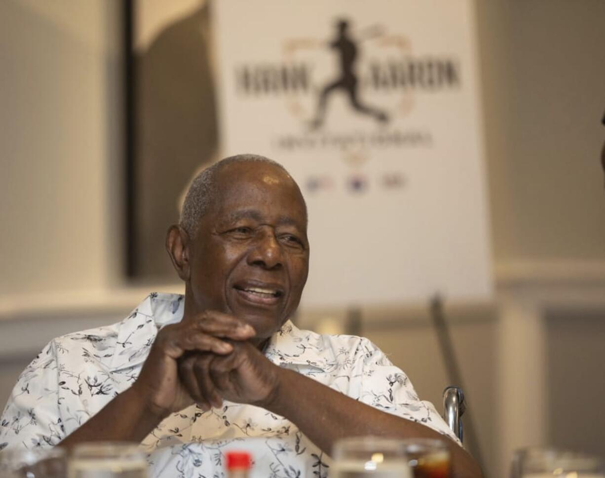 Hank Aaron answers questions from the crowd during the Hank Aaron Invitational at SunTrust Park in Atlanta, Aug. 2, 2019.