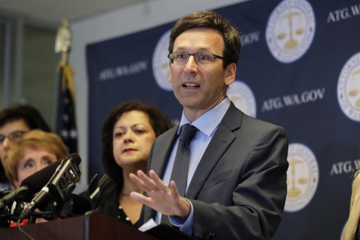 Washington Attorney General Bob Ferguson talks to reporters Aug. 26 during a news conference in Seattle. (AP Photo/Ted S.