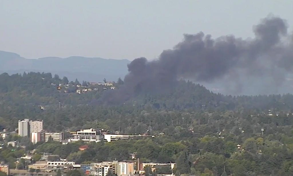 Fire burns near Rocky Butte in northeast Portland in this view from KATU-TV's tower.