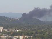 Fire burns near Rocky Butte in northeast Portland in this view from KATU-TV's tower.