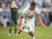 Minnesota United midfielder Ethan Finlay reacts after hitting an MLS soccer match's only goal on a penalty kick during an MLS soccer match against the Portland Timbers, Sunday, Aug. 4, 2019, in St. Paul, Minn.