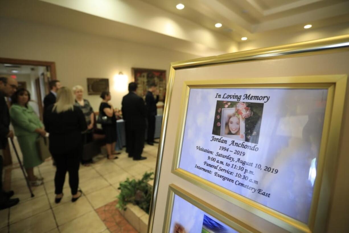 Mourners gather to attend the visitation services for Jordan Anchondo at San Jose Funeral Home in El Paso, Texas on Saturday, Aug. 10, 2019. Andre and Jordan Anchondo, were among the several people killed last Saturday, when a gunman opened fire inside a Walmart packed with shoppers. Authorities say Jordan Anchondo was shielding the baby, while her husband shielded them both.