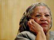 FILE - In this Nov. 25, 2005 file photo, author Toni Morrison listens to Mexicos Carlos Monsivais during the Julio Cortazar professorship conference at the Guadalajara’s University in Guadalajara City, Mexico. The Nobel Prize-winning author has died. Publisher Alfred A. Knopf says Morrison died Monday, Aug. 5, 2019 at Montefiore Medical Center in New York. She was 88.