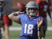 Washington State quarterback Anthony Gordon has big shoes to fill. (AP Photo/Ted S.