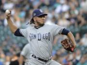 San Diego Padres starting pitcher Dinelson Lamet throws to a Seattle Mariners batter during the first inning of a baseball game Tuesday, Aug. 6, 2019, in Seattle. (AP Photo/Ted S.