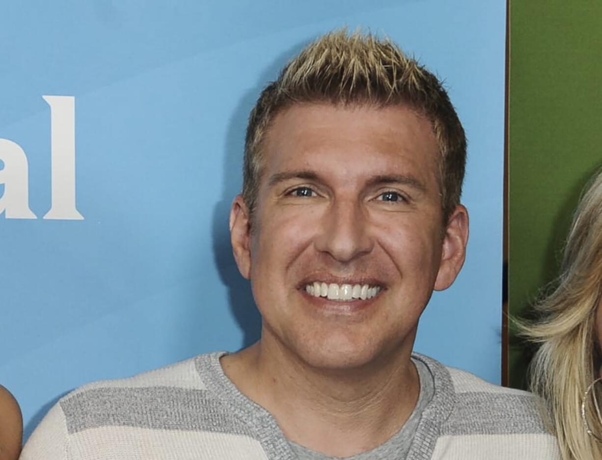 FILE - In this July 14, 2014, file photo, Todd Chrisley attends the NBC 2014 Summer TCA at the Beverly Hilton Hotel in Beverly Hills, Calif. A federal grand jury in Atlanta on Tuesday, Aug. 13, 2019, indicted reality television star Chrisley on tax evasion and other charges.