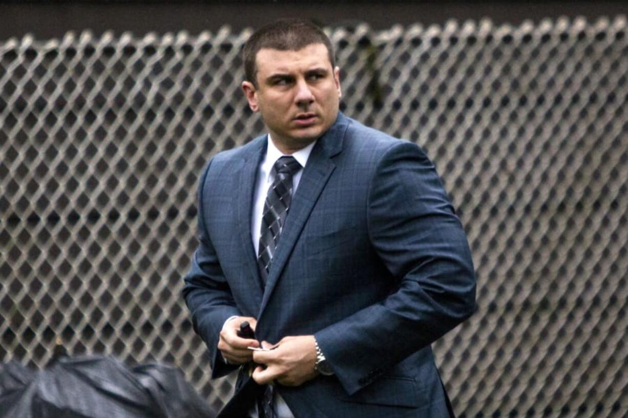 In this May 13, 2019, file photo, New York City Police Officer Daniel Pantaleo leaves his house in the Staten Island borough of New York. An administrative judge on Friday, Aug. 2,2019, has recommended firing Pantaleo, a New York City police officer accused of using a chokehold in the 2014 death of Eric Garner.