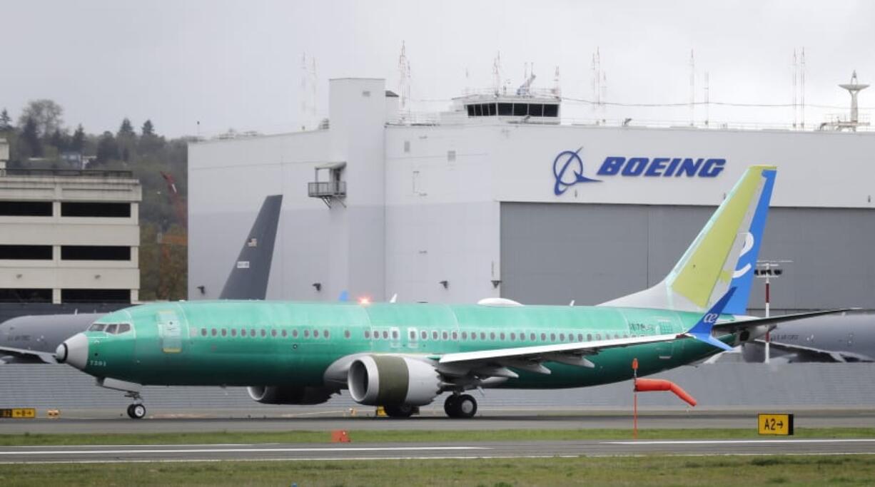 FILE - In this April 10, 2019, file photo a Boeing 737 MAX 8 airplane being built for Spain-based Air Europa rolls toward takeoff before a test flight at Boeing Field in Seattle. A Russian aircraft leasing company that ordered 35 Boeing Max jets is suing the U.S. aircraft maker, accusing it of hiding defects in the plane that has been grounded after two deadly crashes. The Miami-based lawyer for the leasing company said Tuesday, Aug. 27, it is the first lawsuit filed against Boeing by a Max customer. (AP Photo/Ted S.