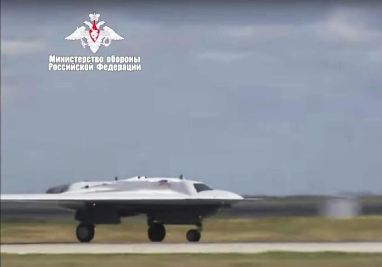 In this video grab made available on Wednesday, Aug. 7, 2019 by Russian Defense Ministry Press Service, Russia’s military drone Okhotnik is seen taking off at an unidentified location in Russia. The ministry said the drone, which has stealth capabilities and is equipped with advanced reconnaissance equipment, made its maiden flight Saturday.