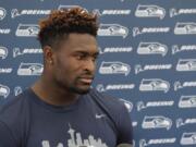 FILE - In this July 29, 2019, file photo, Seattle Seahawks wide receiver DK Metcalf talks to reporters at NFL football training camp in Renton, Wash. L.J. Collier has been out for weeks, Metcalf just underwent surgery and Marquise Blair has a sore back. The Seattle Seahawks still have high hopes for their draft class but many aren’t even on the field currently(AP Photo/Ted S.