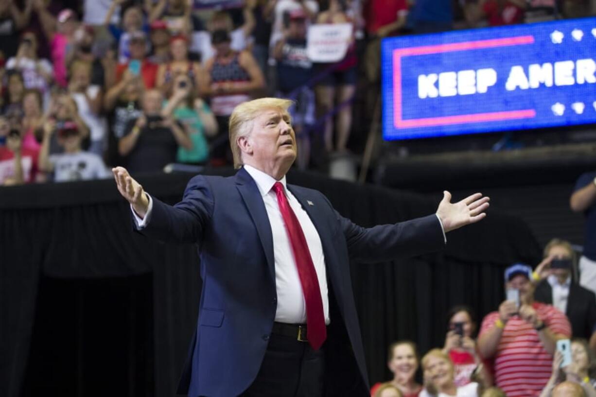 President Donald Trump arrives to speak at a campaign rally Thursday, Aug. 1, 2019, in Cincinnati.