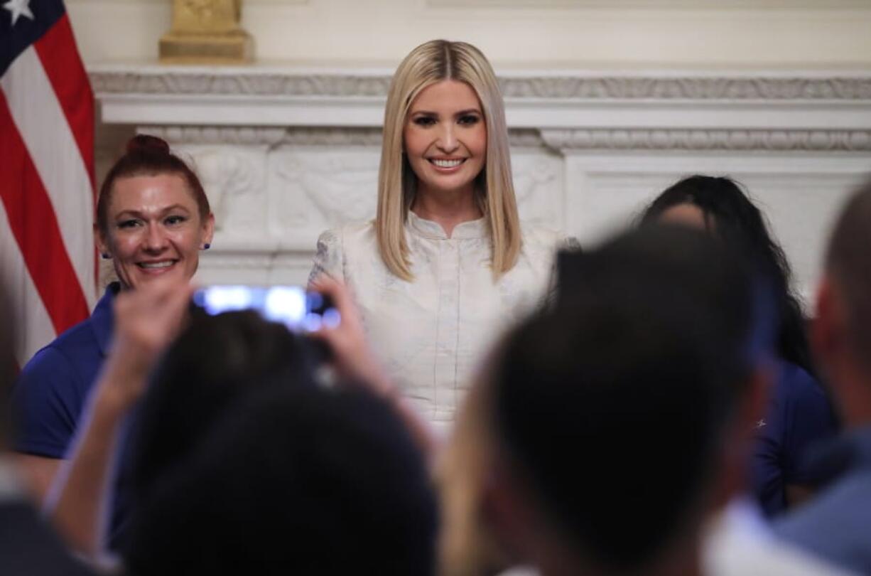 Ivanka Trump, the daughter of President Donald Trump poses for photographs during a “Pledge to America’s Workers” ceremony in the State Dining Room of the White House in Washington, Thursday, July 25, 2019.(AP Photo/Carolyn Kaster)