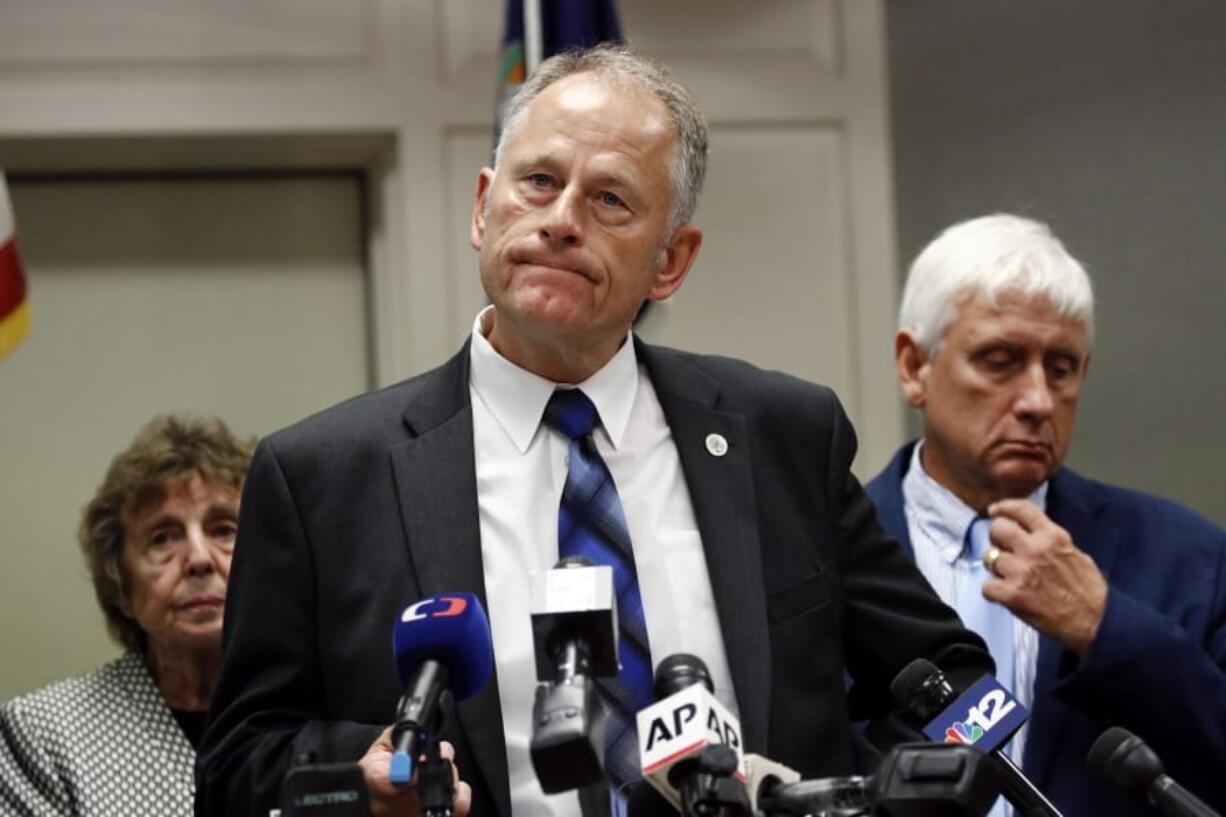 FILE - In this June 1, 2019 file photo, Virginia Beach city manager Dave Hansen speaks at a news conference on a shooting at a municipal building, in Virginia Beach, Va. Hansen announced his resignation Wednesday, Aug. 28. Hansen helped lead the city’s response to one of the worst mass shootings in Virginia history three months ago when a city employee killed 12 people at a municipal building.