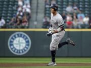 New York Yankees’ Aaron Judge rounds the bases on his two-run home run against the Seattle Mariners during the first inning of a baseball game Tuesday, Aug. 27, 2019, in Seattle.