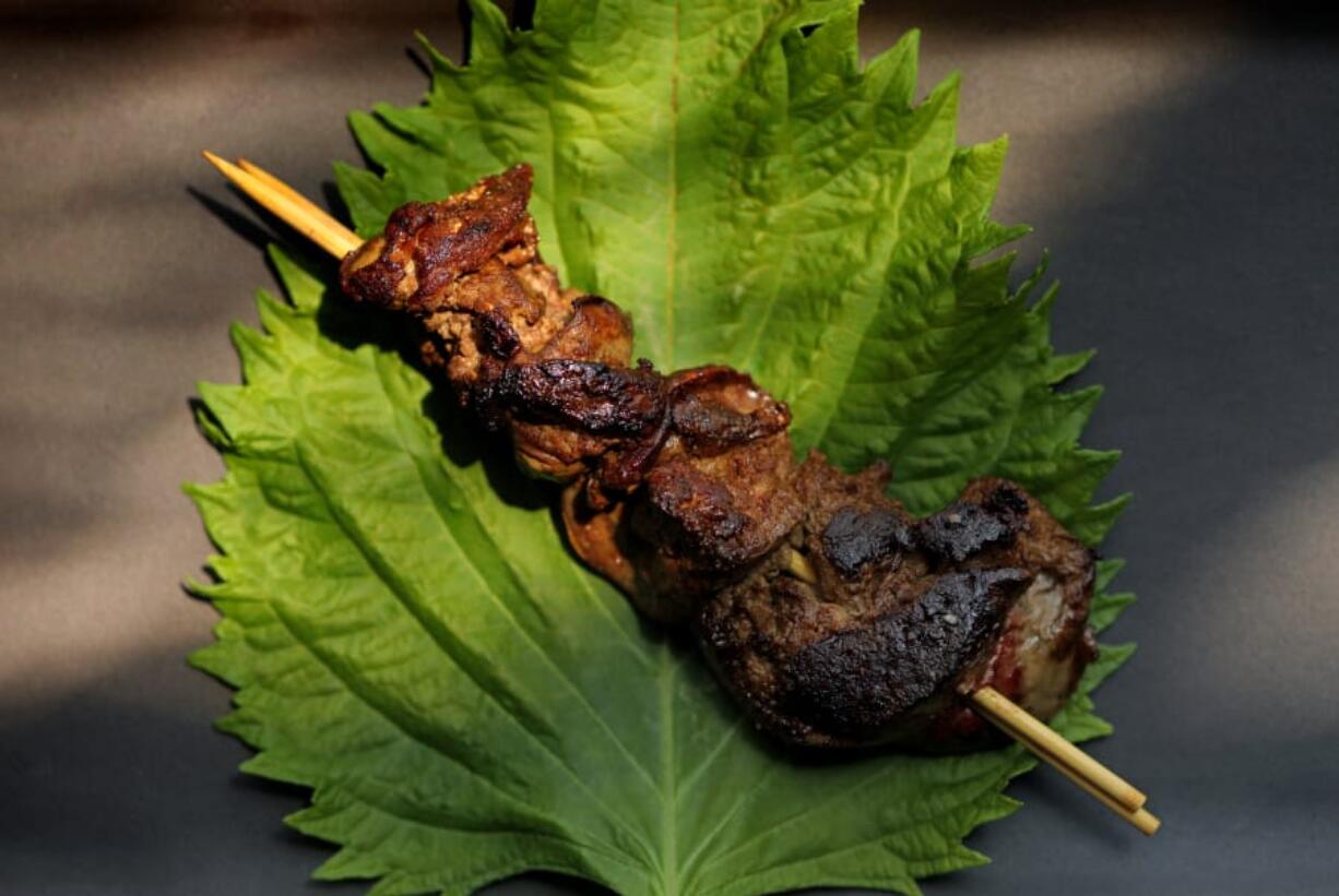 Yakitori (or chicken on a skewer), reba style. Reba is chicken livers. (Christian Gooden/St.