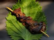 Yakitori (or chicken on a skewer), reba style. Reba is chicken livers. (Christian Gooden/St.