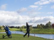 Mountain View’s Willy Yeh hits from the fairway during the 3A District Boy’s Golf Tournament Tri-Mountain Golf Course.