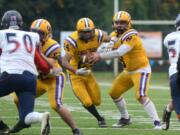 Columbia River running back Isaac Bibb-O’Neil, center, is one of many players looking to step up after 26 seniors graduated.