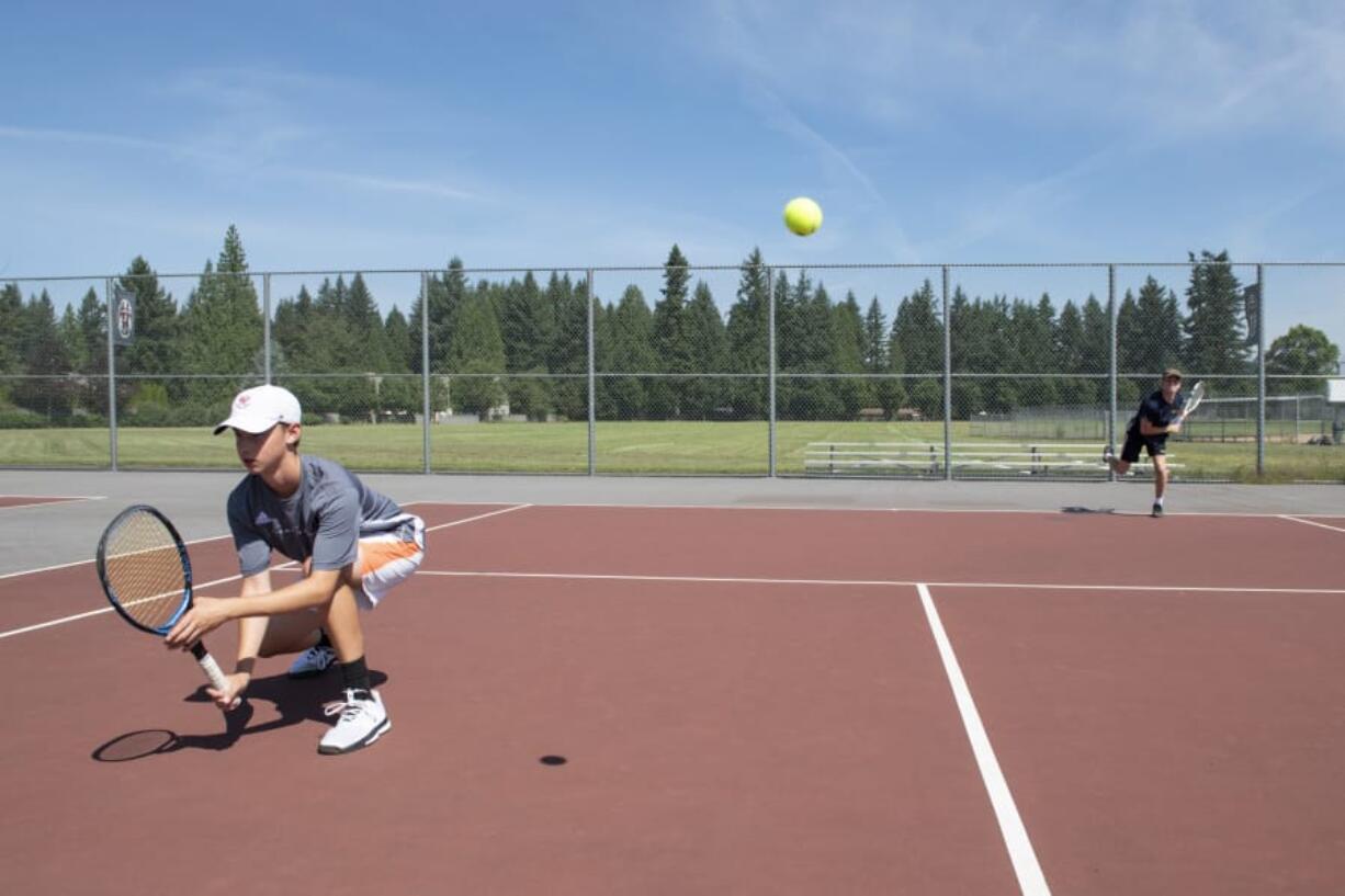 Sophomore Jake Flentke, left, and senior Kyle Mosier practice at Union High School.