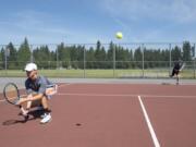 Sophomore Jake Flentke, left, and senior Kyle Mosier practice at Union High School.