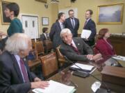 Sander Levin, from left, D-Mich., then the ranking member of the House Ways and Means Committee, confers with then-Rep. Dave Reichert, R-Wash., who was then a member of the committee, in December 2015 on Capitol Hill in Washington. Reichert, who did not seek re-election in 2018, may be eyeing a run for governor.