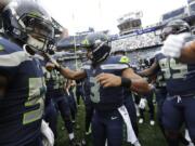 Seattle Seahawks quarterback Russell Wilson (3) always gets his team fired up.