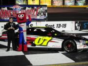 Jadan Walbridge of Vancouver stands in the winner’s circle after a NASCAR Junior Late Model race this summer in Las Vegas.