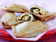 Baked meat empanadas, as seen on Wednesday, Aug. 28, 2019. (Hillary Levin/St.