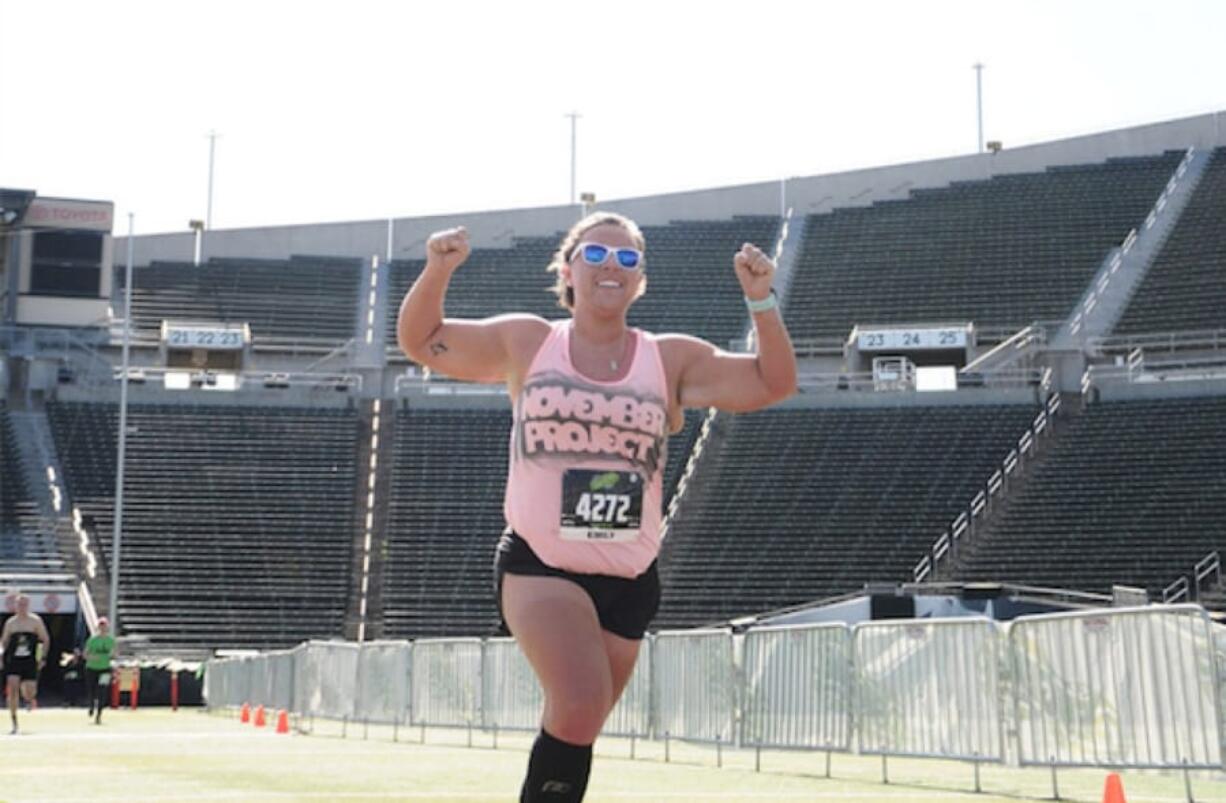 In this photo, available to the public on the Eugene Marathon's official website, Emily Clark crosses the finish line at a time of 2 hours, 52 minutes, 43 seconds. In reality, she had only run the final few miles of the race. Clark&#039;s most recent instance of cheating occured Sept. 15 at the AppleTree Half Marathon in Vancouver when she rode a bicycle for most of the course before running across the finish line as the second-fastest female finisher.