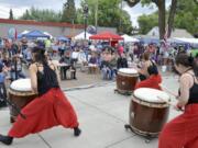 Overlook Park is filled with spectators as they watch Takohachi perform Japanese Taiko drumming during the 2018 Multicultural Festival in Ridgefield.