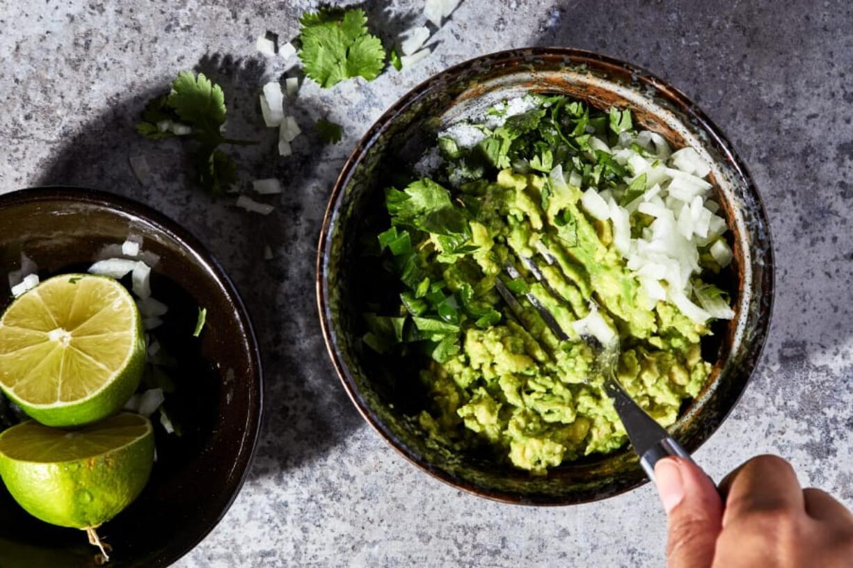 You need nothing more than a bowl and dinner fork to assemble guacamole.