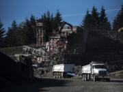 A truck hauls gravel across the quarry on Yacolt Mountain. The gravel is in demand, but nearby residents take a dimmer view of the mine.