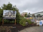 Construction is underway for The Aria apartments on West Sixth Street in downtown Vancouver. The apartments are being built by Cascadia Development Partners, which is headquartered in the Esther Short Building, visible on the right.