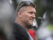 Union head football coach Rory Rosenbach works with his players during the first fall practice Aug. 22 at Union High School.